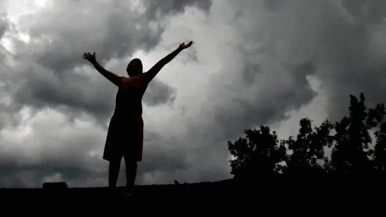 woman-silhouette-sky-praise-celebration-clouds