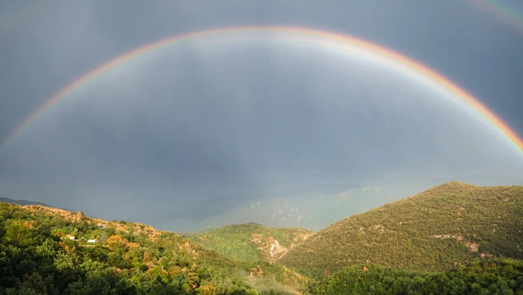 a-rainbow-over-a-mountain