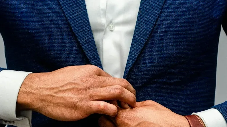 man-in-blue-suit-jacket-and-white-dress-shirt